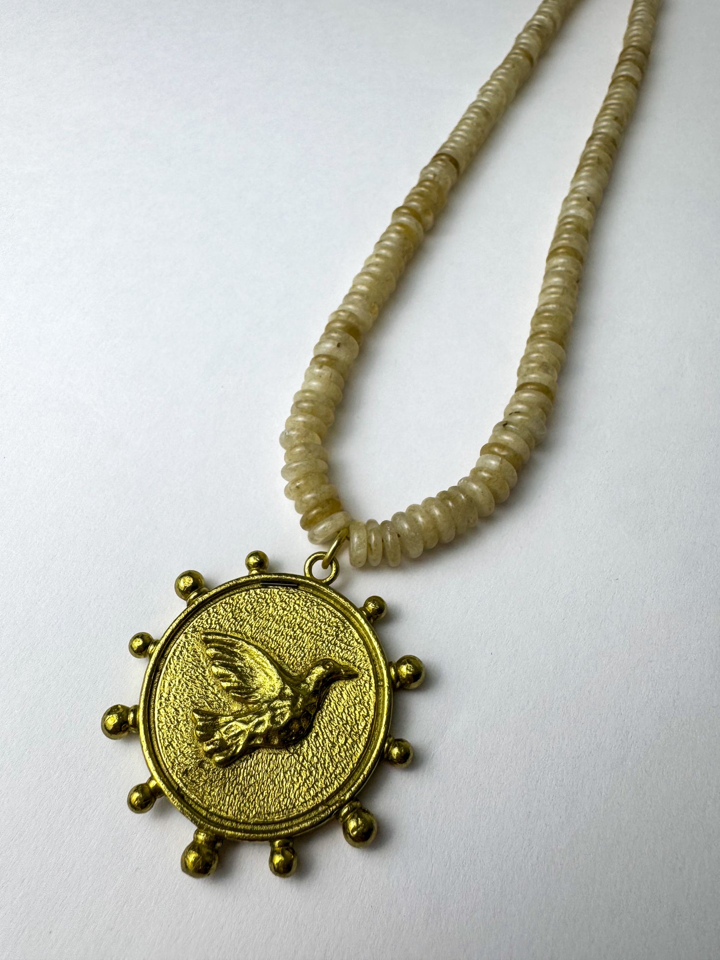 Tan Beaded Necklace with Bird Charm